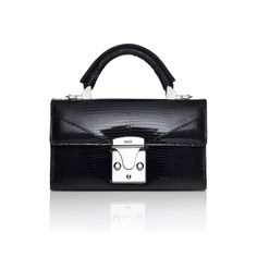 A mini reiteration of STALVEY's signature top handle, the Top Handle 2.0 is a 20cm top handle satchel with architectural envelope front. Tone-on-tone stitching positioned against stark black edge painting creates a more modern take on a classic silhouette. Custom locking closure and prominent top handle accessory. Black Lizard, Leyte, Mini Top, Top Handle Handbags, Trending Handbag, Bag Trends, Mini Handbags, Painting Edges, Mode Inspiration