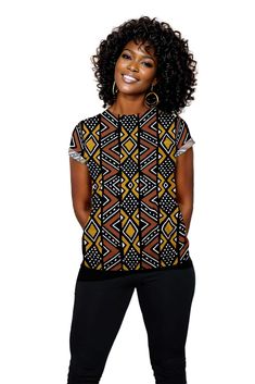 This African Mudcloth Print Women T-shirt showcases a unique and culturally-inspired design. Made from high-quality materials, this t-shirt offers a comfortable fit perfect for everyday wear. Embrace the bold and vibrant style of African prints with this one-of-a-kind piece. Product Features Please Compare your Measurements To our Size Chart This T-shirt is Designed for fashionable women. Made from 5.47 Oz. 100% polyester. Double-needle hemmed sleeves and bottom. Vivid print that will never fade Casual Yellow T-shirt With All Over Print, Yellow Cotton Top With All Over Print, Black Casual Shirt With Geometric Pattern, Casual Black Shirt With Geometric Pattern, Casual Short Sleeve Tops With Unique Print, Relaxed Fit Tops With Unique Print And Short Sleeves, Printed Crew Neck Blouse, Yellow Short Sleeve Top With Sublimation Print, Black Cotton Tops With Geometric Pattern