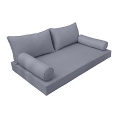 a gray couch with pillows on it