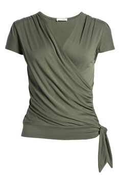 A faux-wrap front flatters on this soft and versatile jersey top cinched with a saucy tie at the hip. 23 1/2" length Surplice V-neck Short sleeves 95% rayon, 5% spandex Machine wash, dry flat Imported Women's Clothing Coastal Casual, Apple Body Shapes, Faux Wrap Top, Flattering Tops, Wrap Shirt, Jersey Top, Wrap Top, Types Of Fashion Styles, V Neck Tops