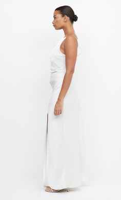 Best selling, high neck maxi dress featuring a flattering tuck detail that cinches the waist and creates a feminine silhouette. Dress is accessed through an invisible side zipper. High Neck Maxi Dress, Silhouette Dress, Woman Reading, Feminine Silhouette, Boat Neckline, Strapless Bra, Invisible Zipper, Side Zipper, The Dreamers