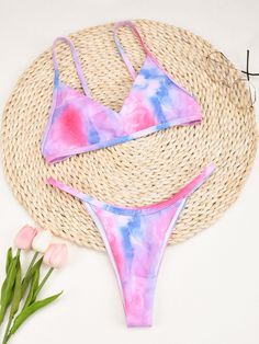 This Brazilian style tie-dyed bikini set will let your grace take the front seat in summer. Made from durable polyester, heat-resistant spandex, and abrasion-resistant nylon, this low-waisted, wire-free bikini set offers the utmost comfort all-day long while giving that sexy feel. This padded bikini set will make every woman's sunbath memorable. SpecificationsBrand Name: GeraldBlackOrigin: CN(Origin)Pattern Type: PrintWaist: Low WaistItem Type: Bikinis SetSupport Type: Wire FreeModel Number: C31 Tie-dye Swimwear For Summer Pool, Tie Dye Triangle Top Swimwear, Summer Tie-dye Swimwear For Pool, Tie Dye Triangle Top Swimwear For Summer, Tie Dye Swimwear For Summer Pool Days, Summer Tie Dye Swimwear For Pool, Summer Tie Dye Triangle Top Swimwear, Tie Dye Swimwear For Pool In Summer, Fitted Tie Dye Swimwear For The Beach