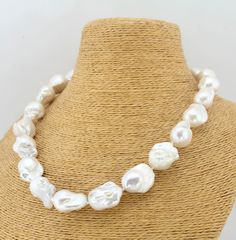 🌟We will package your necklace with beautiful silk bag. (Random color ) 😊After I receive your order, I will select high quality pearls and handmake your unique necklace. ♥Material: Freshwater Pearl ♥ Pearl Size: 14-15mmx18-23mm  (Approx) ♥ Color:White ♥ Pearl Skin: clean, with little flaws,if there are some small pits on the pearls that formed naturally during the growth process 😊Pearl Jewelry Care Tips: 1.Please do not wear pearl jewelry while swimming, showering. 2.Please do not touch the p Baroque Pearl Jewelry, Baroque Pearls Jewelry, Pearl Necklace Choker, Bridesmaid Pearls, Pearl Necklace Wedding, Necklace Elegant, Pearl Jewelry Necklace, Baroque Pearl Necklace, Kesha