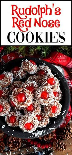 rudolph's red nose cookies on a plate with pine cones