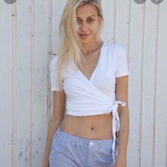 Never Worn Great Condition Casual White Wrap Top, Casual Wrap Crop Top For Summer, Casual Wrap Crop Top For Day Out, White Wrap Tops For Summer, White Wrap Top For Summer, Spring Wrap Crop Top For Day Out, Fitted Wrap Crop Top For Summer, Summer Fitted Wrap Crop Top, Neck Tie Top