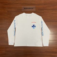 Chorme Heart Gradient Blue Cross White Long Sleeve T-Shirt Brand New Color:White 100%Cotton Size Bust Shoulder Length Sleeve S-----106cm----50cm----68cm----61cm M-----110cm----51cm----70cm----63cm L-----114cm----52cm----72cm----65cm Xl----118cm----53cm----74cm----67cm Casual White Tops With Heart Graphic, Casual White Top With Heart Graphic, Long Sleeve T-shirt With Heart Graphic For Streetwear, White Tops With Heart Graphic, Relaxed Fit, White Relaxed Fit Tops With Heart Graphic, White Relaxed Fit Top With Heart Graphic, Long Sleeve Summer Tops With Heart Graphic, Summer Long Sleeve Tops With Heart Graphic, White Long Sleeve Tops With Heart Graphic