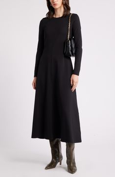 Keep your casual style effortless in this stretch-jersey maxi dress updated with long sleeves and a seam down the middle. 50 1/2" length (size Medium) Slips on over head Crewneck Long sleeves Unlined 93% cotton, 7% spandex Machine wash, tumble dry Imported Long Sleeve Elastane Dress For Fall, Long Sleeve Elastane Dresses For Fall, Fall Long Sleeve Elastane Dress, Fall Maxi Dress With Stretch, Fall Midi Dress In Elastane, Black Long Sleeve Elastane Midi Dress, Full-length Maxi Dress For Work, Stretch Long Sleeve Maxi Dress For Work, Sleek Long Sleeve Maxi Dress