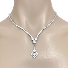 "Exquisite Art Deco bridal necklace featuring 1920s vintage style Gatsby wedding with glam statement pave cz necklace made of sparkly clear cubic zirconia on silver rhodium plated tarnish-resistant base. Necklace total length measures 17\" (43 cm) when opened up and put on a straight line. It secures with a snap clasp. View matching pieces or similar designs at https://www.etsy.com/shop/YJDesign?search_query=lalia View all our collections at yjdesign.com.au" Silver Gatsby Jewelry For Vintage Events, Elegant Rhinestone Necklace For Vintage Events, Art Deco Crystal Necklaces For Formal Events, Art Deco Crystal Necklace For Formal Occasions, Vintage Cubic Zirconia Necklaces For Weddings, Vintage Cubic Zirconia Wedding Necklaces, Art Deco Crystal Necklace For Wedding, Classic Crystal Diamond Necklace For Wedding, Art Deco Diamond Necklace For Wedding