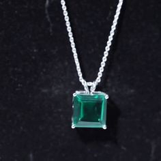 Product Details Express your affection to your loved one with this exceptional Lab Created Emerald Pendant, featuring a sparkling princess cut created emerald solitaire gemstone in a prong setting. Its unique design adds to its charm and desirability, making it an extraordinary piece of jewelry. The Antique Chain Pendant is crafted in gold and comes with a lustrous gold chain, making it an exquisite gift to cherish forever. Product Information SKU SHP-PENDANT082019433 Length 13 mm Width 10 mm Height 7 mm Weight 2.88 gm (Approximate) LAB CREATED EMERALD INFORMATION No.of Stones 1 Pieces Total Weight 5.00 Carat (Approximate) Dimension(approx) Princess Cut-10X10 mm-1 Pcs Color Green Cut Brilliant Shape Princess Cut Setting Type Basket-Setting Quality Grade AAAA View More Product Parent Collec Chain Making, Lab Created Emerald, Emerald Pendant, Signature Jewelry, Solitaire Pendant, Timeless Jewelry, Chain Pendant, Conflict Free Diamonds, Chain Pendants