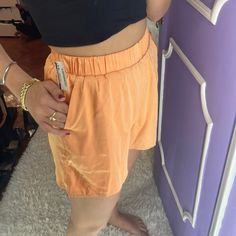 Orange Silky Shorts Cute Style Size Small Orange Bottoms With Built-in Shorts For Loungewear, Yellow Summer Loungewear Bottoms, Orange Loungewear Bottoms With Built-in Shorts, Yellow High-waisted Shorts With Elastic Waistband, Chic Yellow Bottoms With Elastic Waistband, High-waisted Yellow Shorts With Elastic Waistband, Orange Short Bottoms For Loungewear, Orange Vacation Bottoms With Pockets, Orange Bottoms With Pockets For Vacation