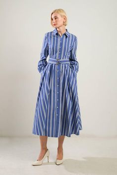 Long sleeves, striped, midi shirt dress with self belt. Available in blue/white/gold. 65% Cotton, 32% Nylon, 3% Spandex US Size (Bust - Waist - Hips) Small 2-4 (34 - 26 -36) Medium 6 (36 - 28 -38) Large 8-10 (38 - 30 -40) Fashion Souls, Outerwear Trends, Striped Midi Dress, Dress Inspiration, Midi Shirt Dress, Polo Dress, Sweatshirt Dress, Modest Outfits, Fall Dresses