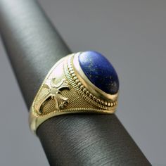 Modern Jewellery Design, Gold Gemstone Ring, Christian Cross, Stone Pattern, Cross Designs, Blue Stone, Modern Jewelry, Elevate Your Style, Gemstone Ring