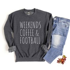 Weekends, coffee and football. Our weekend football sweatshirt is pure comfort. It makes a great gift for moms and for anyone who loves football and game day! These garments are made from polyester and cotton. It's cozy, comfy, soft and warm. The collar is ribbed knit, so it retains its shape even after washing. There are no itchy side seams on these sweaters. .: 50% cotton, 50% polyester .: Medium-heavy fabric .: Loose fit .: Sewn-in label .: Runs true to size These shirts are made to order. Unfortunately, we are unable to speed up production times. It may be possible to expedite shipping only for an additional fee. Please message us for more information. Since all of our shirts are made to order, we do not accept returns. However, your satisfaction is incredibly important to us. If you e Crew Neck Slogan T-shirt For Fall, Relaxed Fit Text Print Top For Weekend, Relaxed Text Print Top For Weekend, Cotton Letter Print Tops For Weekend, Weekend Crew Neck T-shirt, Weekend Crew Neck T-shirt With Letter Print, Weekend Crew Neck Top With Text Print, Weekend Letter Print Crew Neck T-shirt, Crew Neck Cotton T-shirt For Weekend