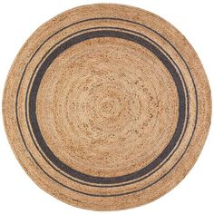 a round rug with black and tan stripes on the bottom, against a white background