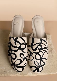 ARTISTIC NOTES To be infinite is to be without limits. Shop more of our Infinite Collection here. PRODUCT DETAILS - One-of-a-kind. Made to order. - Slip on, closed-toe mule with a 1/2 inch heel. - True to size, if you are a true half size you may size down. - 100% Genuine Nappa leather upper. - Synthetic lining and outsole. - Memory foam insole. - Water resistant surface. Wipe clean. - Consciously crafted with a zero waste process. - Supports the creative community. - Hand-crafted in Brazil, han Beige Mules, Animal Fur, Circular Economy, 2 Inch Heels, Leather Mules, Creative Community, Nappa Leather, Zero Waste, Mule