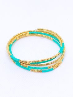 Handmade in Portland, Oregon. This will make the perfect gift! Or, definitely get it for yourself, I support that, too. MEASUREMENTS + MATERIALS - This bracelet is made on an oval shaped memory wire so it will fit your wrist beautifully - This style is my most popular - Green turquoise and gold beads - Other colors available! WHAT PEOPLE SAY “Beautiful craftsmanship, these were for my mother in law, she loves them. I love supporting small businesses.” - Josh “ Love these earrings!! I get so many Gold Bracelets Stacked, Memorial Bracelet, Turquoise And Gold, Turquoise Bead Bracelet, Memory Wire Bracelet, Memory Wire Bracelets, Bracelet Design, Memory Wire, Wire Bracelet