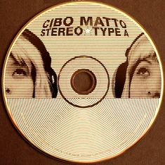 the cd cover for gibo matto stereo typea is shown on a brown surface