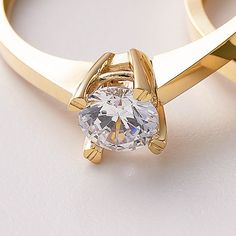 Solitaire Ring 10k 14k 18K Solid Gold/ Special Design Gold Engagement Ring For Her / Handmade Solitaire Fine Jewelry / A+ Cubic Zirconia / Nature Friendly Gift Package 💎 Stone Shape: Round 💎 Stone Cut: Brilliant 💎 Stone Color: DEF Grade 💎 Stone Clarity: VS1 - VVS 💎 Stone Size: 5mm A solitaire ring refers to any piece of jewelry with a single gemstone. A+ cubic zirconia solitaire rings have come to mark some of the most significant occasions in one's life, like sweet-sixteen, anniversaries, and the most notable, an engagement proposal. Traditionally, the solitaire symbolizes the commitment and fidelity between a couple. For this reason, it has become greatly associated with engagements and commitment rings. If you do want to incorporate a solitaire into your wedding  you may get it as Classic Gold Crystal Ring As Gift, Elegant Gold Couple Rings With Cubic Zirconia, Elegant Gold Cubic Zirconia Couple Rings, Elegant Gold Promise Couple Rings, Gold Solitaire Jewelry As Gift, Gold Solitaire Crystal Ring Gift, Classic Gold Crystal Ring With Round Cut, Gold Round Cut Promise Jewelry, Gold Jewelry For Promise With Round Cut