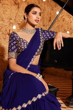 Purple pre-draped mermaid saree with sequin embroidered cut-out border and draped tiered hemline. Comes with embroidered padded blouse. - Aza Fashions Fitted Georgette Dupatta With Draped Sleeves, Traditional Fitted Dupatta With Draped Sleeves, Fitted Pre-draped Saree With Draped Sleeves For Diwali, Wedding Blouse With Draped Sleeves And Fitted Style, Fitted Blouse With Draped Sleeves For Festive Occasions, Fitted Blouse With Draped Sleeves For Wedding, Fitted Pre-draped Festive Saree, Fitted Wedding Blouse With Draped Sleeves, Festive Fitted Blouse With Draped Sleeves