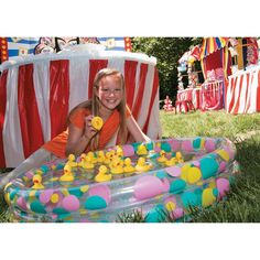 What a quack-tacular way to play a matching game! Just fill the included pool with water and set these yellow ducks afloat! Here's what you do: each duck has a plain or starred number on the bottom of the duck. Take turns selecting a duck from the pool and to check the number for a match. The child who matches the paired numbers together wins! This duck pond game is a great game for a school carnival, field day or party. Plastic and vinyl. (21 pcs. per unit) Includes twenty 2 1/2" ducks and one Duck Pond Game, Carnival Game Ideas, 2 Ducks, Pond Pool, School Carnival, Duck Pond, Carnival Games, Yellow Duck, A Duck