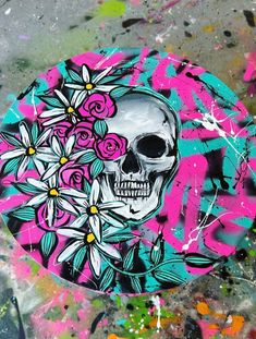 a skull with flowers painted on it