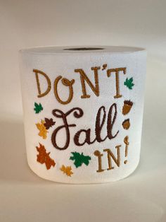 a roll of toilet paper with the words don't fall in printed on it