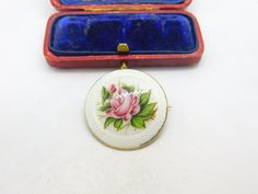 Details: A fantastic and wonderfully designed antique art deco sterling silver gilt and rose flower enamel brooch with super design hallmarked Birmingham 1912 to the reverse possibly by Charles Horner. Very minor nibble to the edge enamel. This is a wonderful item that would make a perfect gift or addition to any collection. The BOX pictured is for PRESENTATION ONLY and is NOT included in the listings but used to frame the pictures unless specifically stated otherwise.  Condition Report: The ite Smart Jewelry, Enamel Brooch, Antique Art Deco, Antique Jewellery, Antique Items, Antique Art, Vintage Watches, Rose Flower, Birmingham