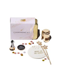 the champagne kit includes two bottles, a bottle opener and some confetti