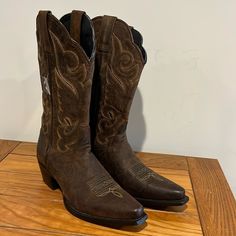 Quality Boots That Are New Without Box. Boots Are Lightweight And The Leather Is In Excellent Condition! The Last Picture Shows The Bottom Clean But The Sale Sticker Marking Shows. These Boots Have Never Been Worn And The Matching 9 B Tag Is Still On Both Boots. Leather Square Toe Heeled Boots For Western-themed Events, Leather Heeled Boots With Pointed Toe For Rodeo, Leather Mid-calf Boots With Stacked Heel For Western Events, Western Fall Boots With Heel Tab, Leather Western Heeled Boots With Almond Toe, Western Leather Heeled Boots With Almond Toe, Western Boots With Square Toe And Heel Pull Tab, Western Heeled Boots With Square Toe And Leather Sole, Leather Moto Boots With Pointed Toe For Western Events