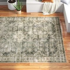 Green Living Room Rugs On Hardwood, Blue And Green Rug Bedroom, Rugs With Dark Green Walls, Area Rug With Green Accents, Cream And Green Area Rugs, Gray Couch Green Rug, Grey Green And Cream Living Room, White Rug With Green Accents, Green And Tan Rug