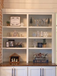 the shelves are decorated with christmas decorations