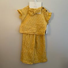 Adorable Baby By Rachel Zoe Yellow Polka Dot 3 Piece Set, Perfect For Spring Or Summer! Size 18m Includes: Top, Pant, Bow Headband Elastic Waistband On Pants Shoulder Button Closure On Top Comment Any Questions You May Have! Cute Yellow Cotton Sets, Yellow Cotton Playtime Sets, Playful Yellow Short Sleeve Sets, Cute Yellow Sets With Short Sleeves, Cute Yellow Set With Short Sleeves, Cute Yellow Short Sleeve Clothing Sets, Cute Yellow Short Sleeve Sets, Yellow Short Sleeve Sets For Playwear, Yellow Short Sleeve Playwear Set