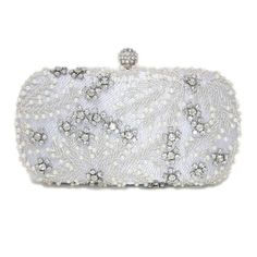 New to our Millennium collection, This beautiful romantic Beige crystal leaves embroidered and beads bridal clutch bag is made of very fine quality of crystal, beads rhinestones, fabric and metal and it comes with two chains, one chains length is 15 inches for a shoulder bad 46 inches long os cross body bag Detachable chain for your Big day! ► ABOUT YOUR ORDER * All items are neatly packaged in our beautiful jewelry boxes and elegant organza bags. * All items are 100% gift-ready. * Each order comes with a personalized handwritten card and a branded Millennium Bride jewelry cloth. * Each order comes with a free gift. ► PERSONALIZTION * If your order is a gift, you may contact us with the recipient's name or a message, and we'll print a personalized card that will be elegantly packaged with Rectangular Wedding Clutch With Rhinestones, Rectangular Rhinestone Wedding Clutch, Elegant Embellished Bridal Accessories For Mother Of The Bride, Embellished Clutch Evening Bag For Reception, Glamorous White Clutch For Wedding, White Embellished Evening Bag For Reception, White Embellished Evening Bag, Rectangular Beaded Evening Bag For Wedding, Silver Embellished Evening Bag For Wedding