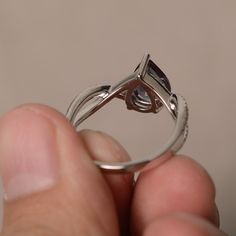 This is a gorgeous handmade creation. Its beauty is its simplicity & Elegance. The 7*9 mm pear shape faceted lab alexandrite is crafted in solid sterling silver and with rhodium plated. All item is sent in a beautiful gift box If you have any idea of design your ring,pls contact me directly. You can realize more lovely stuff clicking the link https://www.etsy.com/shop/knightjewelry?refshopsection_shophome_leftnav Please leave the correct address and you phone number for delivering successful Pear-shaped Birthstone Promise Ring, Pear Diamond Cut Promise Ring, Pear Shaped Diamond Cut Promise Ring, Elegant Teardrop Amethyst Gemstone Ring, Elegant Silver Teardrop Amethyst Ring, Elegant Pear-shaped Amethyst Anniversary Ring, Modern Teardrop Gemstone Rings, Teardrop Diamond Cut Ring As Gift, Elegant Pear-shaped Gemstone Birthstone Ring