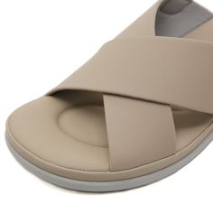 Step into comfort and style with the Siketu Norina Cushioned Slingback Sandal. These sandals feature a cushioned footbed and adjustable slingback strap for a perfect fit. The chic taupe color adds a touch of sophistication to any outfit. Elevate your summer footwear game with Siketu. 1.57'' heel Hook & loop velcro closure PU upper Synthetic Arch support footbed™ Cushioned Insole™ Anti-skid rubber sole Beige Open Toe Synthetic Sport Sandals, Modern Adjustable Slide Sandals, Adjustable Synthetic Slides With Straps, Synthetic Slides With Adjustable Straps And Round Toe, Modern Strappy Sandals With Cushioned Footbed, Comfortable Beige Slingback Sandals For Spring, Comfortable Slingback Sandals With Adjustable Straps And Round Toe, Beige Comfortable Slingback Sandals For Spring, Synthetic Open Toe Slides With Adjustable Straps