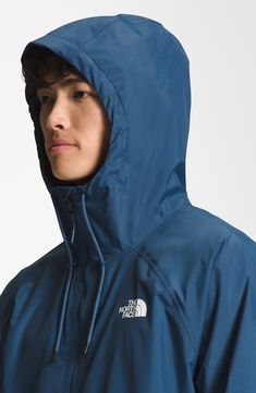 Rainy season has met its match with this hooded jacket crafted from recycled fabrics that offer breathable, lightweight protection from wind and rain. 28 1/2" length (size Medium)   Stand collar; drawcord hood   Durable water-repellent (DWR) finish   PFC-free, durable water-repellent coating is free of per- and poly-fluorinated chemicals, some of which can be harmful to the environment   Secure zip pocket holds cash or key   Lined   100% recycled nylon   Machine wash, tumble dry   Imported Hooded Nylon Raincoat For Outdoor Activities, Recycled Polyester Windbreaker With Drawstring Hood For Outdoor, Blue Waterproof Nylon Hooded Jacket, Blue Weatherproof Parka For Outdoor Activities, Blue Waterproof Hooded Jacket, Blue Waterproof Hooded Jacket For Fall, Hooded Weatherproof Windbreaker For Hiking, Weatherproof Hooded Windbreaker For Hiking, Blue Waterproof Hooded Jacket With Long Sleeves