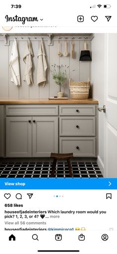 the instagram page shows an image of a kitchen with gray cabinets and white walls