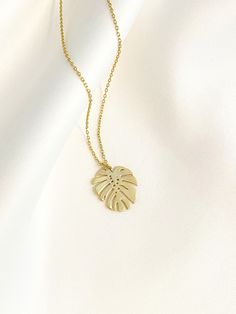 "--NATURE COLLECTION-- This dainty gold monstera leaf necklace is perfect for casual, special occasions or date night. Makes a great gift for Best Friends, Birthdays, Mother's Day, Wedding, Anniversary or any occasion. Choose between 6 beautiful necklace pendants representing the graceful beauty of nature. 1. Tiny Sparkly Bee (12mm x 12mm) 2. Dainty Butterfly (12mm x 10mm) 3. Golden Dandelion (10mm x 16mm) 4. Golden Cactus (9mm x 18mm) 5. Tiny Daisy (11mm x 11mm) 6. Dainty Monstera (16mm x 19mm) Gold Leaf-shaped Nature-inspired Necklace, Nature-inspired Gold Leaf Necklace, Nature-inspired Gold Leaf-shaped Jewelry, Adjustable Gold Nature-inspired Necklace, Trendy Leaf-shaped Jewelry Gift, Gold Nature-inspired Metal Necklace, Trendy Gold Leaf Jewelry, Gold Plated Leaf-shaped Jewelry For Gifts, Adjustable Gold Leaf-shaped Jewelry