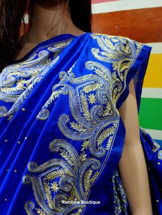 There are two colors 1. Deep Sky Blue 2. Royal Blue This is an authentic hand-embroidered Ari Kashmiri Stitch Saree from Murshidabad district in Bengal. Our skilled artisans entirely handcraft the fine embroidery design. The most significant aspect of hand embroidery is the running stitch pattern that accentuates the various motifs. The running blouse piece is included with this silk saree. Saree Length : 5.5 meters Blouse Piece Length : 0.8 meters Design : Hand Ari Kashmiri embroidery Fabric : Blue Embroidered Fabric With Dori Work For Navratri, Blue Embroidered Dori Work Fabric For Festive Occasions, Blue Traditional Wear With Dori Work, Blue Embroidered Fabric With Dori Work For Festive Occasions, Traditional Embroidered Choli For Transitional Season, Festive Blue Embroidered Fabric With Dori Work, Festive Blue Embroidered Traditional Fabric, Transitional Embroidered Blue Choli, Transitional Season Embroidered Blue Choli