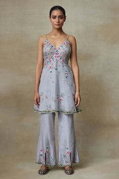 Grey strappy kurta featuring resham embroidered floral vine motifs, highlighted by sequin bead embellishments. Comes with matching pant. - Aza Fashions Spring Designer Salwar Kameez With Mirror Work, Summer Festive Palazzo Set With Intricate Embroidery, Summer Festive Sets With Intricate Embroidery, Spring Festive Salwar Kameez With Mirror Work, Semi-stitched Sets With Mirror Work For Spring, Summer Palazzo Set With Resham Embroidery For Reception, Spring Wedding Palazzo Set With Mirror Work, Embellished Georgette Sharara For Summer, Summer Reception Sharara With Resham Embroidery