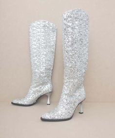 Introducing the Oasis Society Jewel - Knee High Sequin Boots, the epitome of glamour and trend-setting style. These boots are adorned with stunning sequins that extend to knee height, making them a true showstopper. The sequin boot trend is all the rage, and the Jewel embraces this fashion phenomenon with flair and elegance, ensuring you'll make a striking statement wherever you go. Style: Sexy Silhouette: Knee High Boot Embellishment: Sequins Length: Knee Closure: Zipper Heel Height: 3.75" Widt Sparkly Boots, Sequin Boots, The Oasis, Zipper Heels, Trending Boots, Y2k Pink, The Jewel, Pink Style, Black Rose