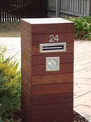 a mailbox with the number 24 on it