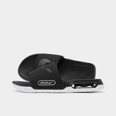 Slip-on design inspired by Nike Air Max line.Plush strap over the foot features Nike branding.Contoured design hugs the foot.Visible Air units in the heels combine with foam footbed for extra comfort.Grooved outsole for traction.The Nike Air Max Cirro Slide is imported..No matter whether you're courtside, poolside or lounging around the crib, the Men's Nike Air Max Cirro Slide Sandals are a perfect fit. Drawing inspiration from the iconic Air Max sneaker lineage and delivering all-day comfort an Sporty Slip-on Slides For Outdoor Activities, Functional Synthetic Slip-on Slides, Sporty Slip-on Slides For Sports, Breathable Sport Sandals For Water Sports, Functional Low-top Synthetic Slides, Sports Sandals With Cushioned Synthetic Footbed, Sporty Slides With Cushioned Footbed For Outdoor, Sporty Outdoor Slides With Cushioned Footbed, Comfortable Sport Sandals With Cushioned Footbed