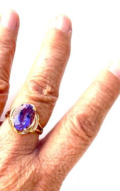 Vintage 14k yellow gold ring engagement ring promise ring with 8 ct faceted amethyst cabochon size 8 3/4 US circa 1980's. Such a beautiful ring. Hallmarked 14k and the amethyst is in great condition such a lovely ring that can make a lady very happy. Timeless Amethyst Promise Ring, Heirloom Tanzanite Rings In Yellow Gold, Heirloom Tanzanite Yellow Gold Rings, Classic Amethyst Jewelry With Center Stone, Fine Jewelry Yellow Gold Tanzanite Rings, Formal 14k Gold Amethyst Ring, Formal 14k Stamped Amethyst Ring, Oval Amethyst Ring Stamped 14k, Timeless Yellow Gold Amethyst Ring