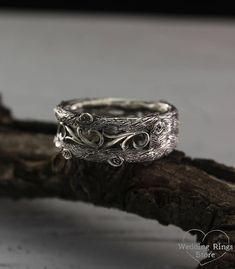 Womens vintage style tree band, Womens unique tree wedding ring, Vine wedding band, Womens tree ring, Wide silver ring, Silver band. ■ All wedding rings are only crafted with the finest of recycled metals DETAILS: Metal - Sterling Silver Dimensions - width 9mm (0.35 in.), Thickness - 1,5mm (0.059 in.) Finish - shiny and oxidized Please choose your ring size and finish in menu while making your order View all tree bands and rings: http://etsy.me/2v9a68V ■ CUSTOM OPTIONS - SIZES AVAILABLE: This ri Unique Antique Silver Wedding Jewelry, Unique Carved Engraved Ring For Promise, Unique Carved Engraved Promise Ring, Sterling Silver Engraved Ring With Carved Details For Wedding, Vintage Hand Forged Engraved Ring For Wedding, Nature-inspired Engraved Wedding Rings, Rustic Silver Jewelry For Anniversary, Antique Silver Wedding Ring Jewelry, Handmade Antique Silver Wedding Ring