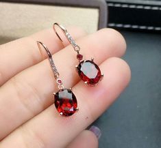 Welcome to Elegant Art Jewelry!  Stone: Natural Red Garnet Stone Size: ( Pendent: 8mm×10mm ), ( Ring: 8mm*10mm ), ( Earrings: 7mm*9mm ) Side Stone: Zircon Metal: 925 Sterling Silver Personalization: 9K/14K/24K/GOLD/SILVER/PLATINUM/ROSE-GOLD/WHITE GOLD. (Contact me)  Red Garnet Pendant, Red Garnet Cuff Pendant, 925 Sterling Silver Pendant, Oval Shape Pendant, Red Garnet Pendant, Red Garnet Engagement, Open Design Pendant, Red Garnet Oval, Emerald Red Garnet, Red Garnet, Red Gemstone, Gemstone Pen Red Oval Cabochon Jewelry For Anniversary, Oval Red Garnet Jewelry, Red Ruby Oval Cabochon Jewelry, Elegant Red Oval Ruby Jewelry, Garnet Jewelry Set, Red Garnet Jewelry, Red Garnet Necklace, Choker Necklace Designs, Necklace Luxury