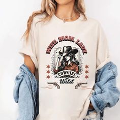 ABOUT OUR "cowgirl tee-shirt" PRODUCT FEATURES. - Medium weight fabric (6.1 oz/yd²). - 100% combed and banded cotton. - Relaxed fit and crew neck. - Double-stitched for durability. - Pre-shrunk fabric. CARE INSTRUCTIONS - Machine wash in cold water with like colors. - Use mild detergent. - Tumble dry or air dry low. - Iron on medium heat if necessary. - Do not bleach or dry clean. HOW TO ORDER PRODUCT  - Please review all photos. - Choose your style, color and size of sweatshirt or t-shirt.( Size chart is available in the product gallery. Please choose your size carefully) - Click "Add to cart". You can go back and follow the same steps to add more items to your cart. - Click "Proceed to checkout". - Add your shipping address and choose your shipping method (PLEASE verify your current addr Midwest Princess, Princess Shirt, Cowgirl Shirts, Choose Your Style, Oct 1, Comfort Color, Low Iron, Rodeo, Medium Weight