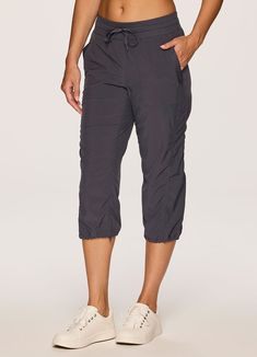 Stretch out in style with our relaxed fit Lumen Lightweight Capri Pant. Lightweight stretch woven fabric allows you to move without restriction, while moisture wicking properties help it to dry quickly to keep you dry and comfortable. Sizable pockets provide convenient on-the-go storage, and an elastic waistband and drawstrings at the waist and leg openings allow for a more customized fit. These best selling relaxed fit capri pants are just the ticket no manner what the activity. Available in ex Nylon Workout Pants With Pockets, Stretch Nylon Cargo Pants With Moisture-wicking, Go-dry Athleisure Hiking Pants, Moisture-wicking Athleisure Pants For Hiking, Versatile Nylon Activewear With Functional Drawstring, Relaxed Fit Go-dry Bottoms For Hiking, Sporty Go-dry Hiking Pants, Versatile Outdoor Activewear With Pockets, Comfort Stretch Nylon Bottoms With Pockets