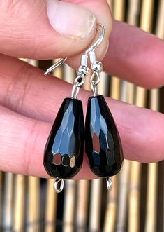 "Natural black onyx gemstones, faceted teardrop shaped, stone size: 20x20mm, drop earrings in 925 sterling silver. Total drop length: 1.75\" x 0.40\" wide. Stone weight: 3 grams each(6 grams both or 30 carats)." Black Teardrop-shaped Jewelry With Faceted Beads, Black Teardrop Jewelry With Faceted Beads, Black Faceted Teardrop Jewelry, Black Teardrop Gemstone Earrings, Black Faceted Bead Earrings For Gift, Black Faceted Beads Earrings For Gift, Photo Frame Ornaments, Black Onyx Earrings, Lapis Lazuli Earrings