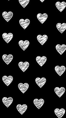 white hearts drawn on a black background